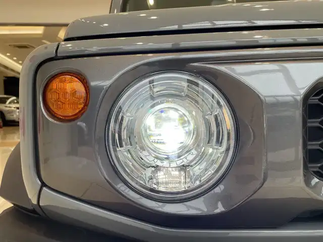 スズキ ジムニー シエラ JC 埼玉県 2023(令5)年 1.9万km ミディアムグレー デュアルセンサーブレーキサポート /純正8インチメモリナビ/　　CD/DVD/BT/フルセグ /バックカメラ /クルーズコントロール /LEDオートライト /シートヒーター /純正15インチアルミホイール /ステアリングスイッチ /ETC