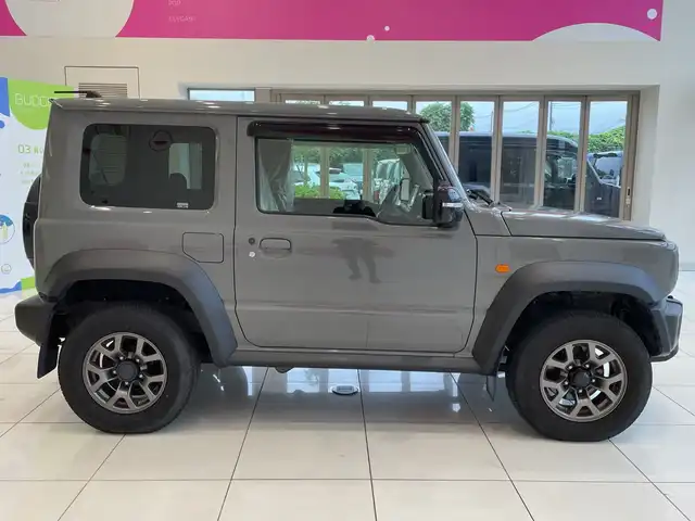 スズキ ジムニー シエラ JC 埼玉県 2023(令5)年 1.9万km ミディアムグレー デュアルセンサーブレーキサポート /純正8インチメモリナビ/　　CD/DVD/BT/フルセグ /バックカメラ /クルーズコントロール /LEDオートライト /シートヒーター /純正15インチアルミホイール /ステアリングスイッチ /ETC