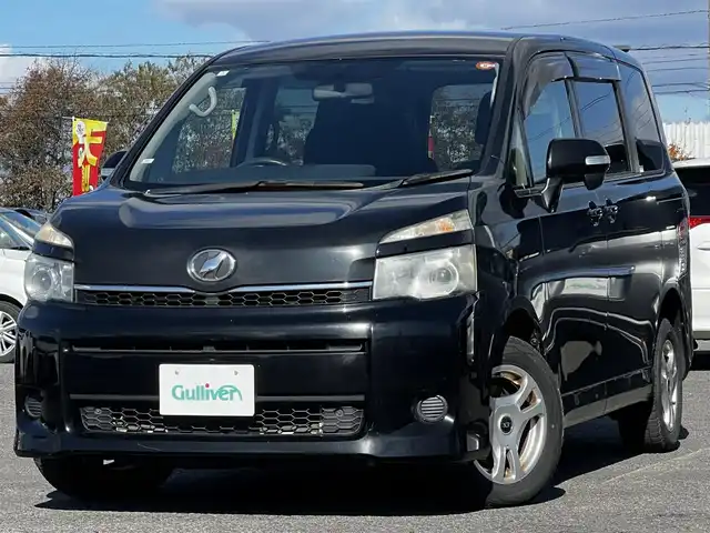トヨタ ヴォクシー X Lエディション 道央・札幌 2012(平24)年 9.8万km ブラック ４WD/社外HDDナビ/AM/FM/BT/CD/DVD/SD/フルセグ/バックカメラ/ビルトインETC/ステアリングリモコン/MTモード付AT/リモコンキー/オートライト/電動格納ミラー/ウィンカーミラー/純正フロアマット/ドアバイザー