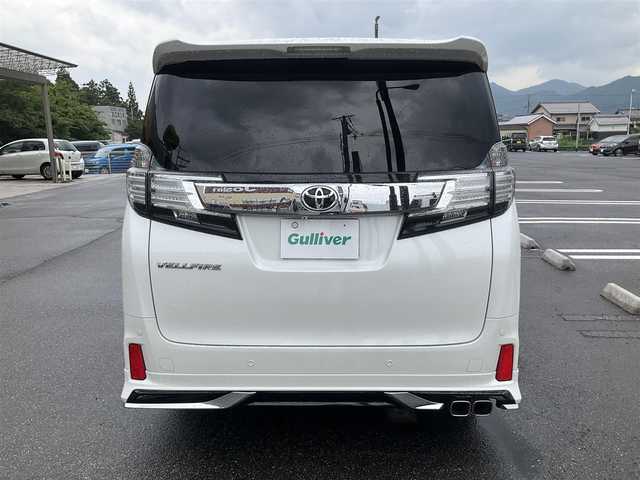 トヨタ ヴェルファイア Z 滋賀県 2016(平28)年 10.5万km ホワイトパールクリスタルシャイン ワンオーナー/アルパイン11インチメモリナビ/　フルセグテレビ　DVD再生機能/　Bluetooth対応　/バックカメラ/アルパインフリップダウンモニター/両側パワースライドドア/社外革調シートカバー/社外ドライブレコーダー/純正LEDヘッドライト/保証書/取扱説明書