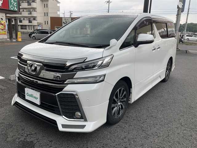 トヨタ ヴェルファイア Z 滋賀県 2016(平28)年 10.5万km ホワイトパールクリスタルシャイン ワンオーナー/アルパイン11インチメモリナビ/　フルセグテレビ　DVD再生機能/　Bluetooth対応　/バックカメラ/アルパインフリップダウンモニター/両側パワースライドドア/社外革調シートカバー/社外ドライブレコーダー/純正LEDヘッドライト/保証書/取扱説明書