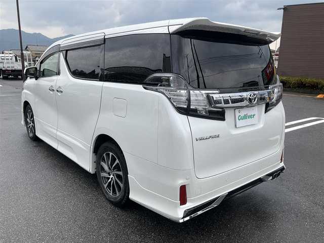 トヨタ ヴェルファイア Z 滋賀県 2016(平28)年 10.5万km ホワイトパールクリスタルシャイン ワンオーナー/アルパイン11インチメモリナビ/　フルセグテレビ　DVD再生機能/　Bluetooth対応　/バックカメラ/アルパインフリップダウンモニター/両側パワースライドドア/社外革調シートカバー/社外ドライブレコーダー/純正LEDヘッドライト/保証書/取扱説明書