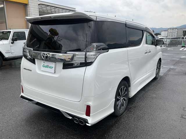 トヨタ ヴェルファイア Z 滋賀県 2016(平28)年 10.5万km ホワイトパールクリスタルシャイン ワンオーナー/アルパイン11インチメモリナビ/　フルセグテレビ　DVD再生機能/　Bluetooth対応　/バックカメラ/アルパインフリップダウンモニター/両側パワースライドドア/社外革調シートカバー/社外ドライブレコーダー/純正LEDヘッドライト/保証書/取扱説明書