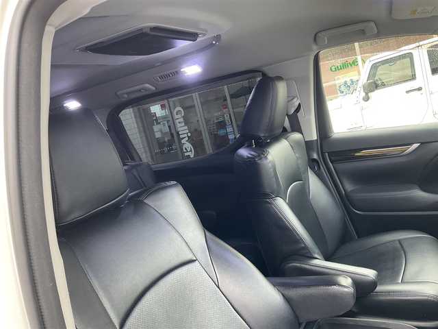 トヨタ ヴェルファイア Z 滋賀県 2016(平28)年 10.5万km ホワイトパールクリスタルシャイン ワンオーナー/アルパイン11インチメモリナビ/　フルセグテレビ　DVD再生機能/　Bluetooth対応　/バックカメラ/アルパインフリップダウンモニター/両側パワースライドドア/社外革調シートカバー/社外ドライブレコーダー/純正LEDヘッドライト/保証書/取扱説明書