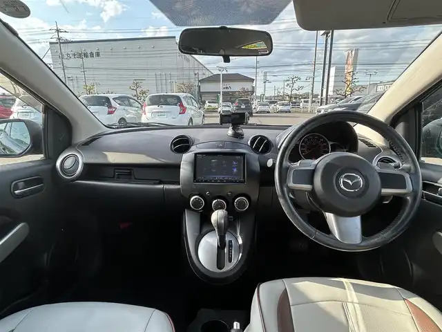 マツダ デミオ SPORT 岡山県 2009(平21)年 6.9万km ラディアントエボニーマイカ ＭＴモード付ＡＴパドルシフト／盗難防止装置／フルフラットシート／ＡＡＣ／ナビでＤＶＤ再生可能／Ｂｌｕｅｔｏｏｔｈ接続／パワーステアリング／パワーウィンドウ