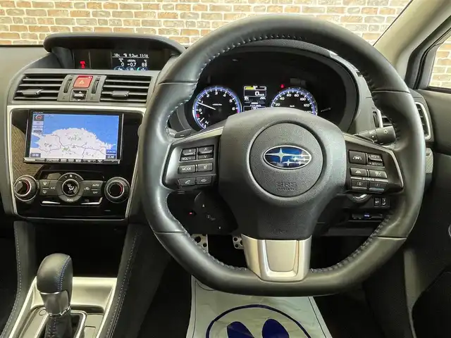 スバル レヴォーグ 1．6GT－S アイサイト 岩手県 2014(平26)年 2.3万km クリスタルホワイトP ワンオーナー/４WD/ターボ/メーカーオプション本革シート/ビルシュタインダンパー/アイサイトVer.3/プリクラッシュブレーキ/全車速追従機能付きクルーズコントロール/アクティブレーンキープ/AT誤発進抑制機能/横滑り防止装置/アイドリングストップ/パドルシフト/パワーシート/シートヒーター/純正ナビ/（CD/DVD/フルセグ/SD/USB）/ステアリングスイッチ/バックカメラ/ETC/LEDヘッドライト/LEDアクセサリーライナー/フロント・リヤフォグランプ/純正18インチアルミホイール