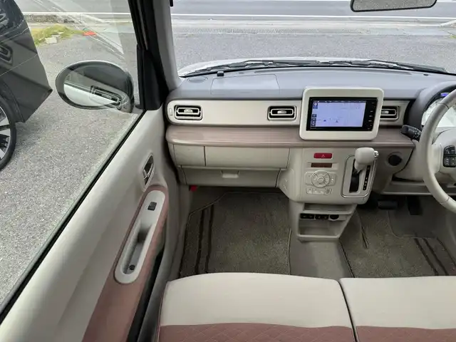 スズキ ラパン X 滋賀県 2024(令6)年 0.9万km フォーンベージュメタリック/ソフトベージュ 2トーン ワンオーナー/純正フルセグナビ/　フルセグ Bluetooth CD  DVD  SD FM AM/バックカメラ/デュアルカメラブレーキサポート/誤発進抑制機能/後退時ブレーキサポート/後方誤発進抑制機能/リヤパーキングセンサー/車線逸脱警報機能/ふらつき警報機能/先行車発進お知らせ機能/ハイビームアシスト/標識認識機能/ハイビームアシスト/純正ドライブレコーダー前後/純正LEDヘッドライト/純正14インチアルミ/純正フロアマット/ETC/スマートキー×2/プッシュスタート/