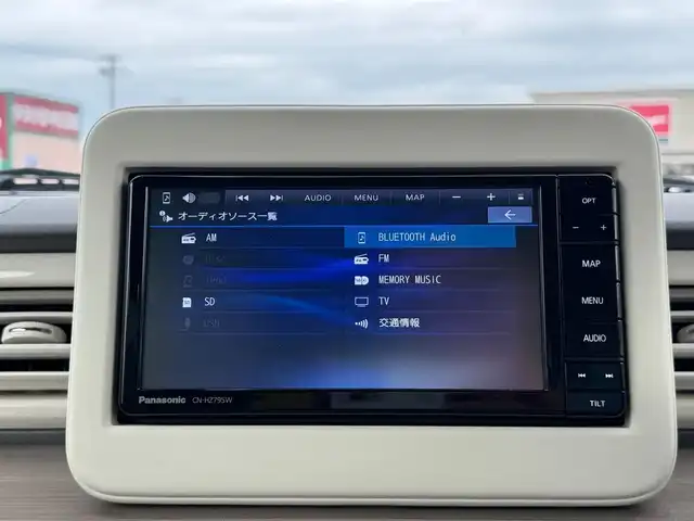 スズキ ラパン X 滋賀県 2024(令6)年 0.9万km フォーンベージュメタリック/ソフトベージュ 2トーン ワンオーナー/純正フルセグナビ/　フルセグ Bluetooth CD  DVD  SD FM AM/バックカメラ/デュアルカメラブレーキサポート/誤発進抑制機能/後退時ブレーキサポート/後方誤発進抑制機能/リヤパーキングセンサー/車線逸脱警報機能/ふらつき警報機能/先行車発進お知らせ機能/ハイビームアシスト/標識認識機能/ハイビームアシスト/純正ドライブレコーダー前後/純正LEDヘッドライト/純正14インチアルミ/純正フロアマット/ETC/スマートキー×2/プッシュスタート/