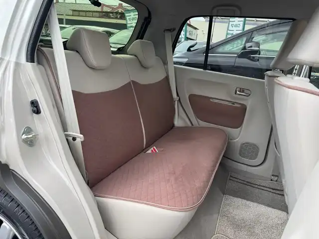 スズキ ラパン X 滋賀県 2024(令6)年 0.9万km フォーンベージュメタリック/ソフトベージュ 2トーン ワンオーナー/純正フルセグナビ/　フルセグ Bluetooth CD  DVD  SD FM AM/バックカメラ/デュアルカメラブレーキサポート/誤発進抑制機能/後退時ブレーキサポート/後方誤発進抑制機能/リヤパーキングセンサー/車線逸脱警報機能/ふらつき警報機能/先行車発進お知らせ機能/ハイビームアシスト/標識認識機能/ハイビームアシスト/純正ドライブレコーダー前後/純正LEDヘッドライト/純正14インチアルミ/純正フロアマット/ETC/スマートキー×2/プッシュスタート/