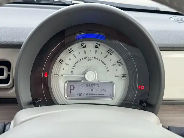 スズキ ラパン X 滋賀県 2024(令6)年 0.9万km フォーンベージュメタリック/ソフトベージュ 2トーン ワンオーナー/純正フルセグナビ/　フルセグ Bluetooth CD  DVD  SD FM AM/バックカメラ/デュアルカメラブレーキサポート/誤発進抑制機能/後退時ブレーキサポート/後方誤発進抑制機能/リヤパーキングセンサー/車線逸脱警報機能/ふらつき警報機能/先行車発進お知らせ機能/ハイビームアシスト/標識認識機能/ハイビームアシスト/純正ドライブレコーダー前後/純正LEDヘッドライト/純正14インチアルミ/純正フロアマット/ETC/スマートキー×2/プッシュスタート/