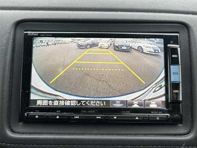 ホンダ ヴェゼル ハイブリッド Z 愛知県 2015(平27)年 10.1万km ホワイトオーキッドパール ワンオーナー/SDナビ（BT/SD/FM/AM/DVD/CD)/ワンセグTV/バックカメラ/LEDヘッドライト/フォグランプ/ETC/プッシュスタート/運転席＆助手席シートヒーター/パドルシフト/革ステアリング/ルーフレール/純正17インチAW/スマートキー/スペアキー