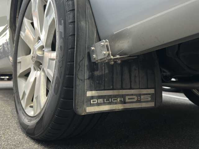 三菱 デリカＤ：５ D－Power package 愛知県 2013(平25)年 12万km ウォームホワイトP/クールシルバー 構造変更　乗車定員4人(3列目シート取り外し後車内積み込み有り)/ワンオーナー/ルーフキャリアー/ルーフボックス（INNO SHADOW124）/サイドオーニング（FIAMMA F45S）/両側パワースライドドア/社外SDナビ（CN-MW240D）/フルセグ・CD・AM・FM/バックカメラ/クルーズコントロール/前席シートヒーター/パドルシフト/LEDヘッドライト/フォグランプ/オートライト/スマートキー/ビルトインETC/純正フロアマット/純正ドアバイザー/ディーラー点検整備記録簿H25～R6/保証書/取扱説明書/スペアスマートキー