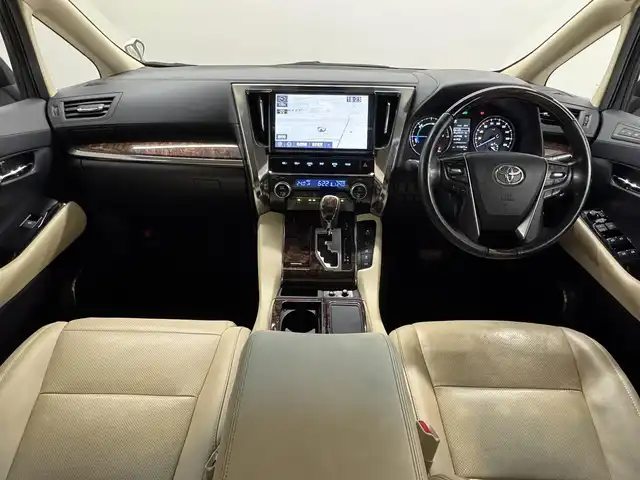 トヨタ アルファードハイブリット G Fパッケージ 三重県 2019(令1)年 11.2万km ホワイトパールクリスタルシャイン ハイブリッド/E-four（4WD）/MTモード付インパネCVT/純正 10インチナビ NSZN-Z68T/（AM/FM/CD/DVD/TV/SD/SDREC/Bluetooth）/バックガイドモニター/モデリスタエアロ（F/S/R下）/両側パワースライドドア/ドライブレコーダー 前後/ビルトイン ETC/Toyota Safety Sense/・プリクラッシュセーフティ/・レーントレーシングアシスト/・レーダークルコン（全車速追従機能付）/・アダプティブハイビームシステム/・インテリジェントクリアランスソナー（パーキングサポートブレーキ［静止物＆後方接近車］）/・【OP】ブラインドスポットモニター＆リヤクロストラフィックアラート/・ロードサインアシスト［RSA］/など/装備/・【OP】ツインムーンルーフ/・【OP】デジタルインナーミラー/・ベージュ本革シート/・AC100Vアクセサリーコンセント（1500W：5ヶ）/・シートヒーター＆ベンチレーション（D/N）/・ステアリングヒーター/・エグゼクティブパワーシート（D6way/N4way＆電動オットマン/2ndシート電動リクライニング・オットマン）/・両側パワースライドドア/・パワーバックドア/など