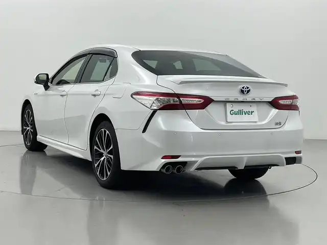 トヨタ カムリ WSレザーパッケージ 熊本県 2018(平30)年 6.7万km プラチナホワイトパールマイカ 純正ナビ（ＣＤ・ＤＶＤ・フルセグ・ＢＴ）/バックカメラ　/社外前後ドライブレコーダー　/ビルトインＥＴＣ　/前後クリアランスソナー　/前席シートヒーター　/前席パワーシート　/社外レーダー　/トヨタセーフティーセンス/・プリクラッシュセーフティ/・オートハイビーム/・ブラインドスポットモニター/・リアクロストラフィックアラート/・レーンディパーチャーアラート/・ロードサインアシスト/横滑り防止装置/ヘッドアップディスプレイ/ハーフレザーシート/純正フロアマット/純正１８インチAW/オートライト/LEDヘッドライト/フォグライト/スマートキー/プッシュスタート/保証書/取扱説明書