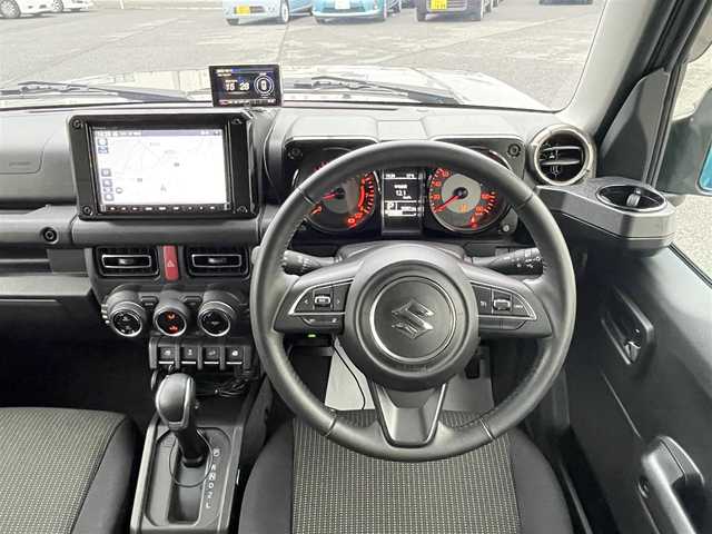 スズキ ジムニー シエラ JC 群馬県 2024(令6)年 1.1万km ブルームピンクメタリック 衝突軽減ブレーキシステム/レーンキープアシスト/レーダークルーズコントロール/社外メモリナビゲーション/（CD/DVD/SD/BT/フルセグTV）/バックカメラ/ビルトインETC/ナビ連動ドライブレコーダー/レーダー探知機/前席シートヒーター/ミラーヒーター/LEDヘッドライト/電格ミラー/ドアバイザー/社外シーケンシャルテールランプ/社外マフラー/純正フロアマット/純正15インチアルミホイール