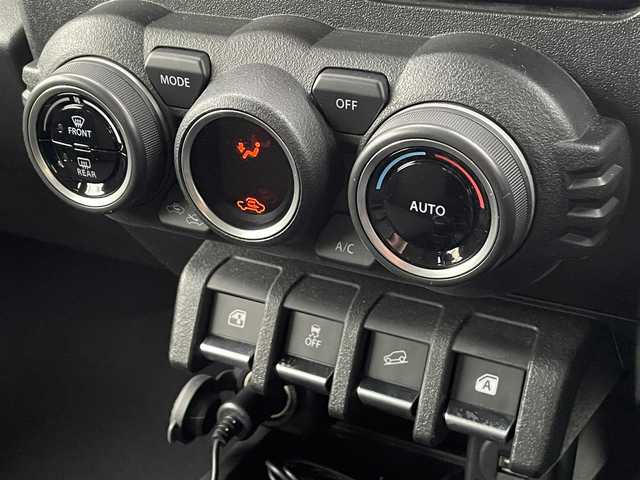 スズキ ジムニー シエラ JC 群馬県 2024(令6)年 1.1万km ブルームピンクメタリック 衝突軽減ブレーキシステム/レーンキープアシスト/レーダークルーズコントロール/社外メモリナビゲーション/（CD/DVD/SD/BT/フルセグTV）/バックカメラ/ビルトインETC/ナビ連動ドライブレコーダー/レーダー探知機/前席シートヒーター/ミラーヒーター/LEDヘッドライト/電格ミラー/ドアバイザー/社外シーケンシャルテールランプ/社外マフラー/純正フロアマット/純正15インチアルミホイール