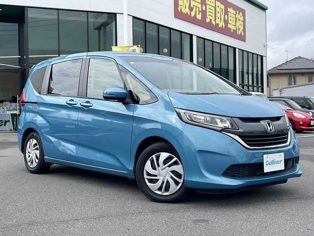 ホンダ フリード G ホンダセンシング 長野県 2018(平30)年 1.6万km ブルーホライゾンM ホンダセンシング/純正9インチナビ（VXM-187VFNi）/FM・AM・DVD・CD・フルセグテレビ/Bluetooth Audio/バックカメラ/レーダークルーズコントロール/前後ドライブレコーダー/(F・Gathers  R・カロッツェリア)/両側パワースライドドア/ステアリングスイッチ/ワイパーデアイサー/アイドリングストップ/純正フロアマット/ロールカーテン/LEDヘッドライト/オートライト/プッシュスタート/スマートキー/ETC