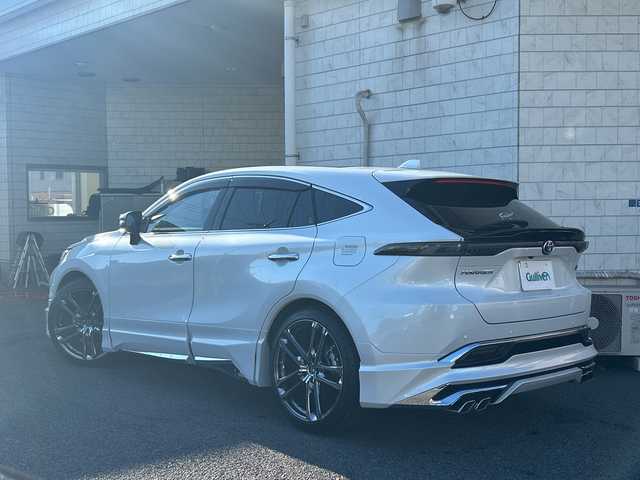 トヨタ ハリアー ハイブリッド Z レザーパッケージ 神奈川県 2023(令5)年 2.7万km プラチナホワイトパールマイカ JBLサウンドシステム/調光パノラマルーフ/モデリスタエアロ/wedsクレンツェ21インチアルミ/純正ナビ(AM/FM/USB/BT/フルセグTV/Miracast)/パノラミックビューモニター/RS-Rダウンサス/衝突被害軽減ブレーキ/レーンキープアシスト/ブラインドスポットモニター/クリアランスソナー/オートハイビーム/レーダークルーズコントロール/黒革シート/D/N席エアーシート/D/N席パワーシート(D席メモリー)/ステアリングヒーター/デジタルインナーミラー/ヘッドアップディスプレイ/パワーバックドア/ビルトインETC2.0/前方ドライブレコーダー/社外GPSレーダー/純正夏タイヤ付AW積込/スペアキー×1/保証書/取扱説明書