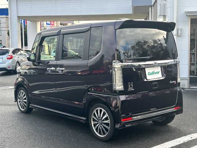 ホンダ Ｎ ＢＯＸ カスタム G ターボ Lパッケージ 東京都 2016(平28)年 7.3万km プレミアムベルベットパープル・パール GathersフルセグTVナビ（VXM-175VFNi）/・Bluetooth/AUX/USB/純正15インチアルミホイール/純正フロアマット/バックカメラ/ETC/両側パワースライドドア/横滑り防止装置/盗難防止装置/ドアバイザー/オートライト/後席サンシェード/プッシュスタート/後席チップアップシート/スマートキー/スペアキー1本/保証書