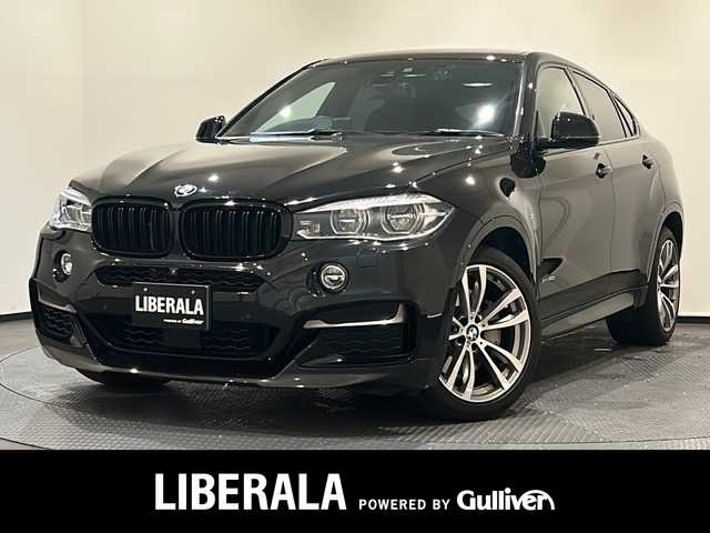 ＢＭＷ Ｘ６ xDrive50i Mスポーツ 新潟県 2018(平30)年 2.9万km サファイアブラックP XDrive（４WD）/電動ガラス・サンルーフ/ドライビングアシストプラス/・アクティブクルーズコントロール/・車線逸脱警告機能/・衝突回避/被害軽減ブレーキ/コンフォートパッケージ/・フロントコンフォートシート/・フロントベンチレーションシート/・4ゾーンオートマチックエアコンディショナー/10.2インチワイドディスプレイ/・HDDナビゲーション/・Bluetooth/USB/AUX/・CD/DVD/・フルセグTV/Mエアロダイナミクスパッケージ/ハーマンカードン/ヘッドアップディスプレイ/ETC/前後ドライブレコーダー/ソフトクローズ/オートマチックテールゲートオペレーション