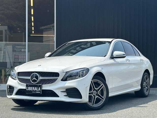 メルセデス・ベンツ Ｃ２２０ｄ ローレウスED スポーツプラスPKG 福岡県 2021(令3)年 5.1万km ポーラホワイト レーダーセーフティパッケージ/アダプティブクルーズコントロール/ブラインドスポットモニター/レーンキープアシスト/アクティブセーフティブレーキ/ワイヤレス充電/ヘッドアップディスプレイ/純正ナビ/Applecarplay/androidauto/フルセグTV/バックカメラ　/Bluetooth/エアーサスペンション/黒革シート/前席シートヒーター/パワーバックドア/LEDヘッドライト/純正18インチアルミホイール/ETC/スペアキー×1