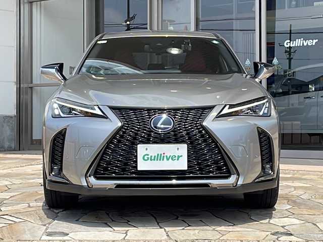 レクサス ＵＸ 250h Fスポーツ 静岡県 2020(令2)年 2.5万km ソニックチタニウム 【主要装備】/純正ナビ　/アラウンドビューモニター　/赤レザーシート　/ステアリングスイッチ　/レーダークルーズコントロール　/ドライブレコーダー　/プッシュスタート　/スマートキー　/パドルシフト　/ハンドルヒーター　/サンルーフ/置くだけ充電/ブレーキホールド/ETC2.0/ブラインドスポットビューモニター