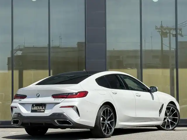 ＢＭＷ ８４０ｄ xDriveグランクーペ 石川県 2019(令1)年 2.1万km ミネラルホワイト 4WD/純正HDDナビ/バック/サイド/全方位カメラ/ｈａｒｍａｎ／ｋａｒｄｏｎオーディオ/AppleCarPlay/Bluetooth/USB/ヘッドアップディスプレイ/アダプティブクルーズコントロール/インテリジェントセーフティー/衝突軽減ブレーキ/パドルシフト/ブラインドスポットモニター/電動格納ミラー/ワイヤレスチャージャー/赤／黒革シート/パワーシート/メモリーシート/シートヒーター/シートベンチレーション/ドライブレコーダー/ミラー一体型ETC