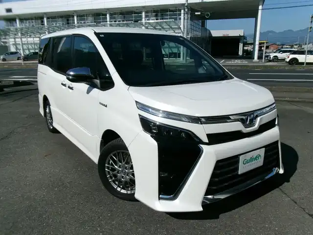 トヨタ ヴォクシー ハイブリッド ZS 煌 群馬県 2018(平30)年 5.1万km ホワイトパールクリスタルシャイン Toyota Safety Sense C/純正SDナビ/バックカメラ/両側パワースライドドア/シートヒーター/クルーズコントロール/2.0ETC/ニーエアバッグ
