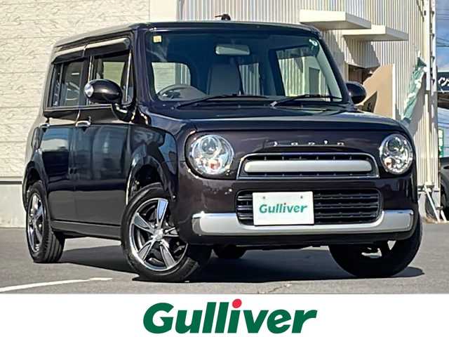 スズキ ラパン ショコラ X 道北・旭川 2014(平26)年 3.7万km アーバンブラウンパールメタリック /4WD//禁煙車//純正メモリナビ//BT/SD/AUX/1セグ//バックカメラ//アイドリングストップ//合皮シート//シートヒーター//ミラーヒーター//オートライト//HIDヘッドライト//エンジンスターター//プッシュスタート//スマートキー//純正フロアマット//ドアバイザー