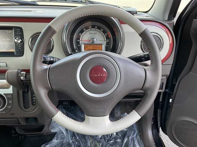 スズキ ラパン ショコラ X 道北・旭川 2014(平26)年 3.7万km アーバンブラウンパールメタリック /4WD//禁煙車//純正メモリナビ//BT/SD/AUX/1セグ//バックカメラ//アイドリングストップ//合皮シート//シートヒーター//ミラーヒーター//オートライト//HIDヘッドライト//エンジンスターター//プッシュスタート//スマートキー//純正フロアマット//ドアバイザー