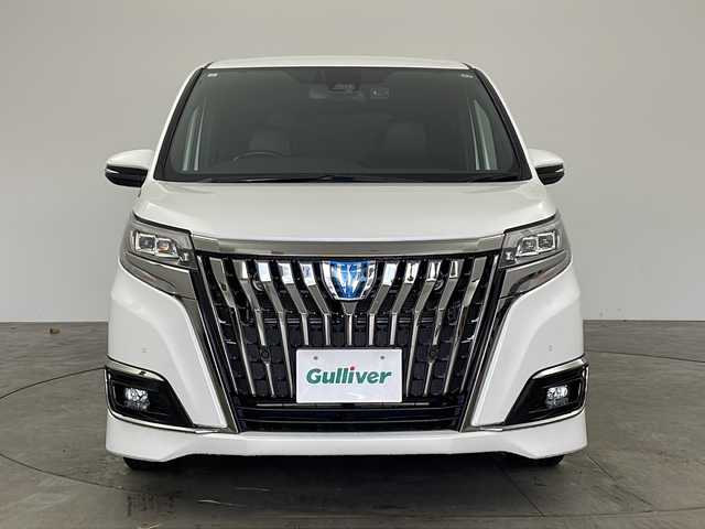 トヨタ エスクァイア ハイブリッド Gi プレミアムパッケージ ブラックテーラード 兵庫県 2021(令3)年 5.8万km ホワイトパールクリスタルシャイン ・社外9インチSDナビ（X9NX）/CD/DVD/SD/BT/フルセグ/・バックカメラ/・ビルトインETC/・Toyota　Safety　Sense/プリクラッシュセーフティ/レーンディパチャーアラート/オートマチックハイビーム/先行車発進告知/・クルーズコントロール/・横滑り防止装置/・パーキングサポートブレーキ/・車両接近通報装置/・両側パワースライドドア/・ステアリングスイッチ/・ステアリングヒーター/・合皮シート/・前席シートヒーター/・純正フロアマット/・ＬＥＤヘッドライト/・オートライト/・純正15インチアルミホイール/・ドライブレコーダー/・スマートキー/・スペアキー/・クリアランスソナー/・取扱説明書/・保証書