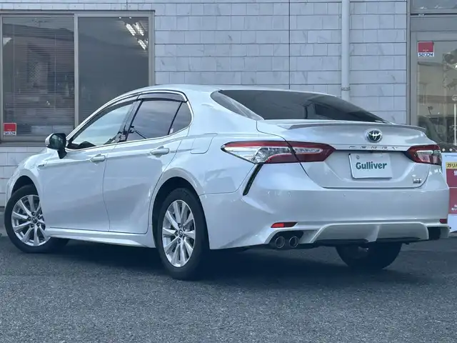 トヨタ カムリ WS 福岡県 2019(令1)年 4.7万km プラチナホワイトパールマイカ 純正7インチメモリナビ/　（AM/FM/CD/DVD/Bluetooth/フルセグTV）/バックカメラ/トヨタセーフティセンス/・プリクラッシュセーフティシステム/・レーンディバーチャーアラート/・オートマチックハイビーム/・レーダークルーズコントロール/オートライト/横滑り防止装置/クリアランスソナー/コーナーセンサー/純正17インチAW/黒色ハーフレザーシート/パワーシート（D席）/パドルシフト/ビルトインETC/前方ドライブレコーダー/電格ウインカーミラー/純正フロアマット/ドアバイザー/プッシュスタート/ステアリングスイッチ/ISOFIX/電源ソケット×1/保証書/取扱説明書