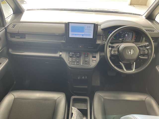ホンダ ステップワゴン スパーダ eHEV 沖縄県 2024(令6)年 3.5万km トワイライトミストブラックパール 社外ディスプレイオーディオ（Bluetooth）/バックカメラ/ETC/レーダークルーズコントロール/ダウンヒルアシストコントロール/パドルシフト/ステアリングスイッチ/シートヒーター/ハーフレザーシート/両側パワースライドドア/電動リアゲート/プッシュスタート/スマートキー/スペアキー/LEDヘッドライト/オートライト/サンシェード/クリアランスソナー/保証書/取扱説明書