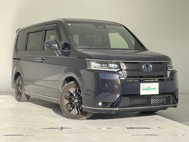 ホンダ ステップワゴン スパーダ eHEV 沖縄県 2024(令6)年 3.5万km トワイライトミストブラックパール 社外ディスプレイオーディオ（Bluetooth）/バックカメラ/ETC/レーダークルーズコントロール/ダウンヒルアシストコントロール/パドルシフト/ステアリングスイッチ/シートヒーター/ハーフレザーシート/両側パワースライドドア/電動リアゲート/プッシュスタート/スマートキー/スペアキー/LEDヘッドライト/オートライト/サンシェード/クリアランスソナー/保証書/取扱説明書