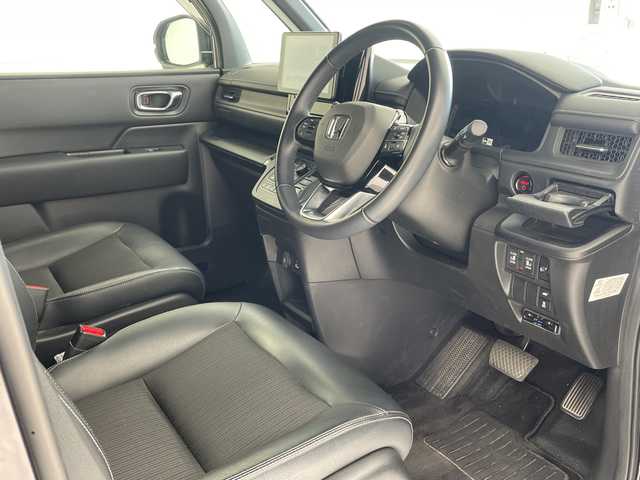 ホンダ ステップワゴン スパーダ eHEV 沖縄県 2024(令6)年 3.5万km トワイライトミストブラックパール 社外ディスプレイオーディオ（Bluetooth）/バックカメラ/ETC/レーダークルーズコントロール/ダウンヒルアシストコントロール/パドルシフト/ステアリングスイッチ/シートヒーター/ハーフレザーシート/両側パワースライドドア/電動リアゲート/プッシュスタート/スマートキー/スペアキー/LEDヘッドライト/オートライト/サンシェード/クリアランスソナー/保証書/取扱説明書