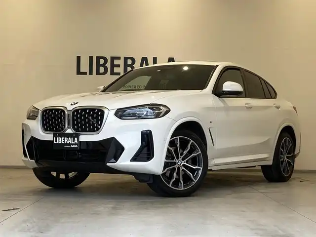 ＢＭＷ Ｘ４ xDrive 20d Mスポーツ 熊本県 2022(令4)年 3.9万km アルピンホワイトⅢ ・スマートキー/・プッシュスタート/・サンルーフ/・インテリジェントセーフティ/・注意喚起アシスト/・レーンチェンジアシスト/・ステアリングアシスト/・PDC自動起動/・アクティブPDC緊急ブレーキ/・パーキングアシスト/・クルーズコントロール(追従式)/・オートハイビーム/・黒革シート/・前席パワーシート/・全席シートヒーター /・純正メモリナビ/　【Bluetooth・USB・AppleCarPlay】/・フルセグTV/・全方位カメラ/・ETC/・パワーバックドア/・LEDヘッドランプ/・純正マット/・保証書/取説