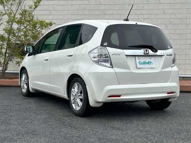 ホンダ フィット ハイブリット ナビ プレミアムセレクション 茨城県 2011(平23)年 15.1万km プレミアムホワイトパール 純正ナビ/純AW/バックカメラ/シートヒーター/電動格納ミラー/ワイパーデアイサー/スマートキー/AAC/ドアバイザー/Wエアバック/ABS/クルーズコントロール/前ドライブレコーダー/オートライト/ステアリングリモコン