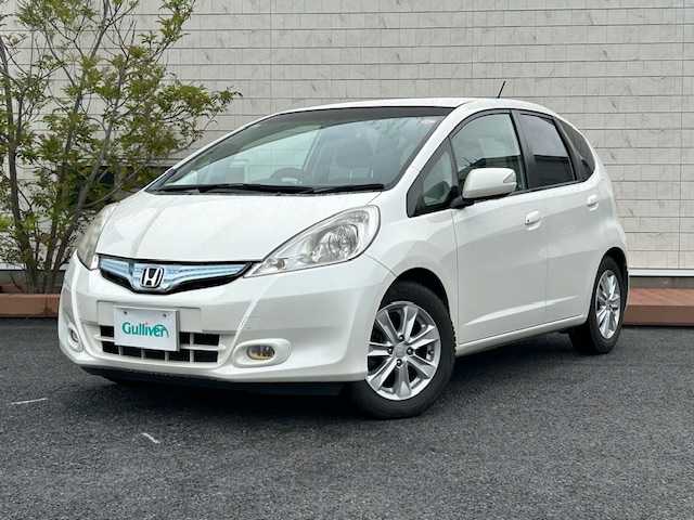 ホンダ フィット ハイブリット ナビ プレミアムセレクション 茨城県 2011(平23)年 15.1万km プレミアムホワイトパール 純正ナビ/純AW/バックカメラ/シートヒーター/電動格納ミラー/ワイパーデアイサー/スマートキー/AAC/ドアバイザー/Wエアバック/ABS/クルーズコントロール/前ドライブレコーダー/オートライト/ステアリングリモコン