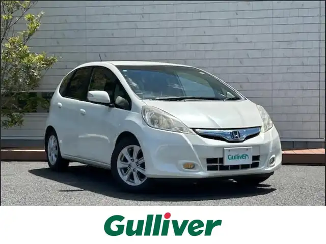 ホンダ フィット ハイブリット ナビ プレミアムセレクション 茨城県 2011(平23)年 15.1万km プレミアムホワイトパール 純正ナビ/純AW/バックカメラ/シートヒーター/電動格納ミラー/ワイパーデアイサー/スマートキー/AAC/ドアバイザー/Wエアバック/ABS/クルーズコントロール/前ドライブレコーダー/オートライト/ステアリングリモコン