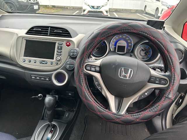 ホンダ フィット ハイブリット ナビ プレミアムセレクション 茨城県 2011(平23)年 15.1万km プレミアムホワイトパール 純正ナビ/純AW/バックカメラ/シートヒーター/電動格納ミラー/ワイパーデアイサー/スマートキー/AAC/ドアバイザー/Wエアバック/ABS/クルーズコントロール/前ドライブレコーダー/オートライト/ステアリングリモコン