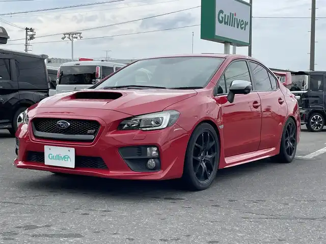 スバル ＷＲＸ ＳＴＩ STI 青森県 2016(平28)年 13.7万km ピュアレッド ４WD/6速MT/車高調(純正サスペンション有)/社外ナビ(フルセグTV/CD/DVD/AM・FM/BT/HDMI)/バックカメラ/サイドビューモニター/ETC/前方ドラレコ/社外SSR18インチアルミホイール(純正アルミホイール有)/純正フロアマット/スペアキー