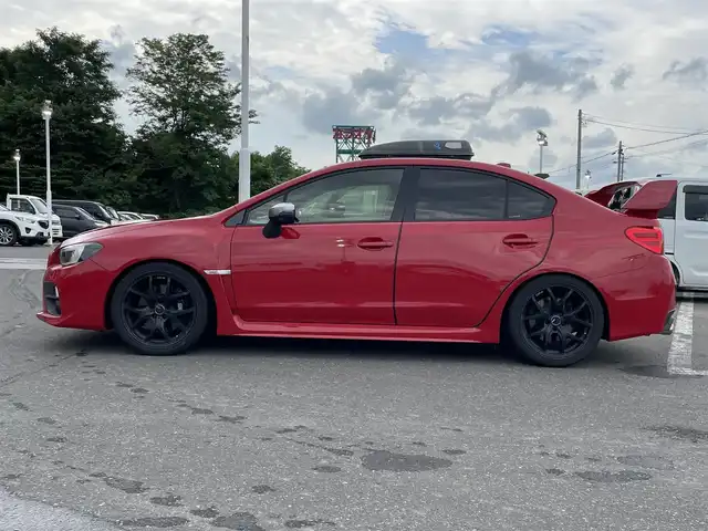 スバル ＷＲＸ ＳＴＩ STI 青森県 2016(平28)年 13.7万km ピュアレッド ４WD/6速MT/車高調(純正サスペンション有)/社外ナビ(フルセグTV/CD/DVD/AM・FM/BT/HDMI)/バックカメラ/サイドビューモニター/ETC/前方ドラレコ/社外SSR18インチアルミホイール(純正アルミホイール有)/純正フロアマット/スペアキー