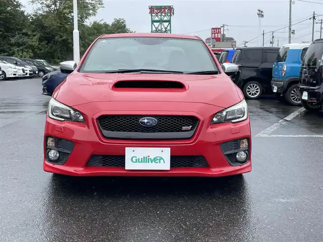 スバル ＷＲＸ ＳＴＩ STI 青森県 2016(平28)年 13.7万km ピュアレッド ４WD/6速MT/車高調(純正サスペンション有)/社外ナビ(フルセグTV/CD/DVD/AM・FM/BT/HDMI)/バックカメラ/サイドビューモニター/ETC/前方ドラレコ/社外SSR18インチアルミホイール/純正アルミホイール付きスタッドレスタイヤ積込/純正フロアマット/スペアキー