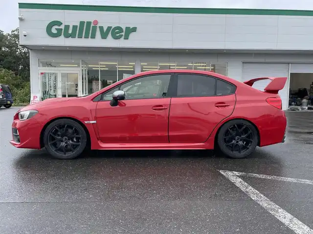 スバル ＷＲＸ ＳＴＩ STI 青森県 2016(平28)年 13.7万km ピュアレッド ４WD/6速MT/車高調(純正サスペンション有)/社外ナビ(フルセグTV/CD/DVD/AM・FM/BT/HDMI)/バックカメラ/サイドビューモニター/ETC/前方ドラレコ/社外SSR18インチアルミホイール/純正アルミホイール付きスタッドレスタイヤ積込/純正フロアマット/スペアキー