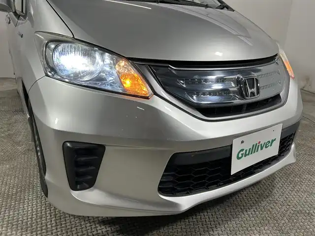 ホンダ フリード ハイブリット ジャストセレクション+ 大阪府 2014(平26)年 2.8万km スーパープラチナメタリック 純正ナビ(フルセグ/DVD再生/Bluetooth) バックカメラ ETC クルコン 両側パワースライドドア オートライト ハーフレザー HIDヘッドライト スマートキー