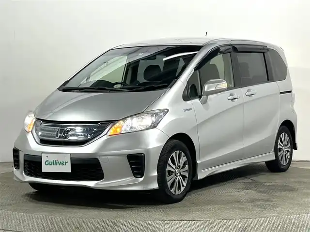 ホンダ フリード ハイブリット ジャストセレクション+ 大阪府 2014(平26)年 2.8万km スーパープラチナメタリック 純正ナビ(フルセグ/DVD再生/Bluetooth) バックカメラ ETC クルコン 両側パワースライドドア オートライト ハーフレザー HIDヘッドライト スマートキー