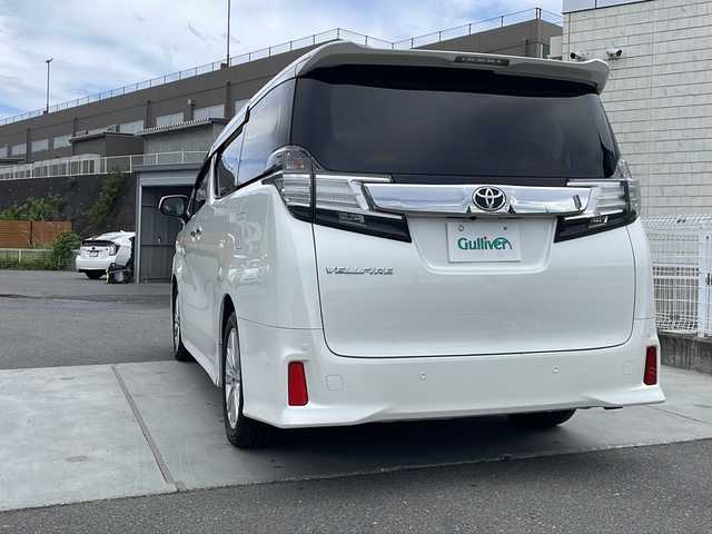 トヨタ ヴェルファイア Z Aエディション 山梨県 2015(平27)年 7.9万km ホワイトパールクリスタルシャイン 社外7ナビ/Bluetooth/バックカメラ/クルーズコントロール/フリップダウンモニター/両側パワースライドドア/横滑り防止装置/ETC/アイドリングストップ/LEDヘッドライト/オートライト/純正18インチAW/プッシュスタート/スマートキー/フロアマット/スペアキー/取扱説明書/保証書