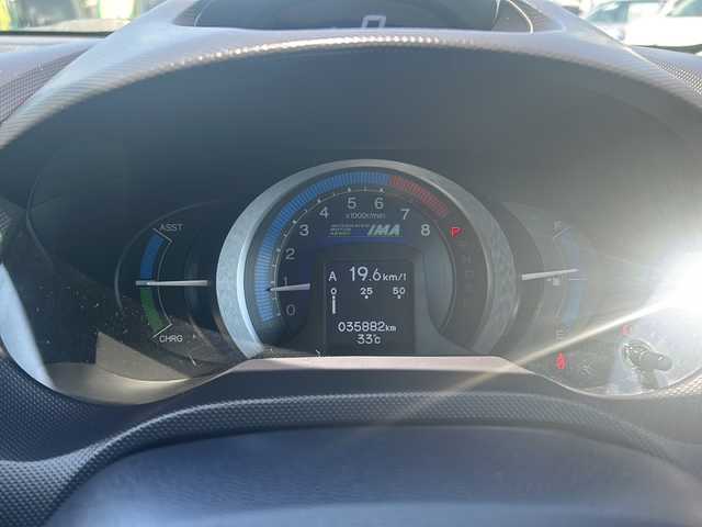 ホンダ インサイト G 鳥取県 2009(平21)年 3.6万km アラバスターシルバーメタリック Honda HDDインターナビシステム/7インチワイドディスプレイ/AM/FM、CD/DVD、Bluetooth/ワンセグテレビ/バックカメラ/ドアバイザー/ETC(ナビゲーションシステムと連動)/ABS/プロジェクタータイプ ハロゲンヘッドライト/電波式キーレスエントリーシステム/運転席用＆助手席用SRSエアバッグシステム