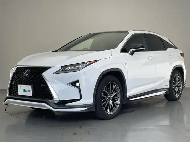 レクサス ＲＸ 450h Fスポーツ 愛知県 2016(平28)年 8.6万km ホワイトノーヴァガラスフレーク メーカーナビ　フルセグTV　Bluetooth　360°アラウンドビューモニター　パノラマルーフ　マークレビンソン　赤革　シートヒーター　シートベンチレーション　パワーバックドア　TRDエアロ　LEDライト　衝突軽減装置　追従クルコン　HUD　BSM　ETC2.0　AC１００V電源　ステアリングヒーター　パワーシート　禁煙車/純１２型ＤＡナビ　フルセグＴＶ　全方位カメラ　パノラマルーフ　マークレビンソン　赤革　シートベンチレーション　ＨＵＤ　パワーバックドア　ＴＲＤエアロ　ＥＴＣ２．０　レーダークルコン　衝突軽減　禁煙車/　