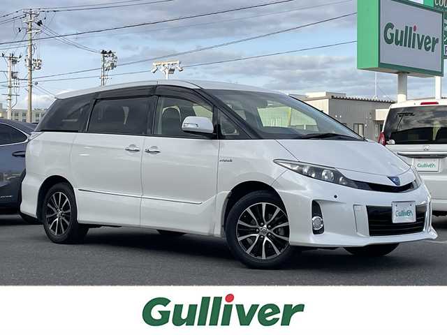 トヨタ エスティマ ハイブリッド アエラス 青森県 2013(平25)年 11.4万km ホワイトパールクリスタルシャイン 禁煙/純正ナビ/CD/DVD/DTV/Bluetooth/バックカメラ/両側パワースライドドア/社外AW付スタッドレス積み込み/HIDオートライト/クルーズコントロール/コーナーセンサー/パワーシート/パワーバックドア/スマートキー/プッシュスタート/純正フロアマット/ドアバイザー/ETC